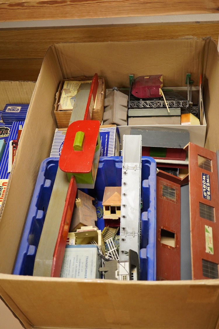 A collection of Hornby Dublo railway for 3-rail running, including three boxed locomotives; an LNER class A4 4-6-2 tender locomotive, Sir Nigel Gresley 7 (EDL1), a BR Duchess of Montrose 46232 (EDL12), and a BR class N2